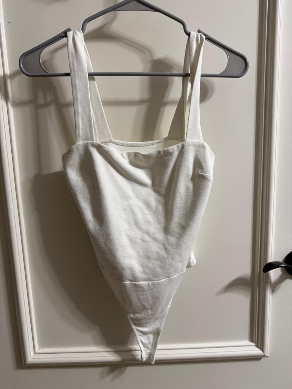 Lulu's White Ribbed One-Piece Bodysuit